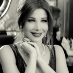 Nancy Ajram Serves Old Hollywood Glamour in “Hassa Beek” Music Video
