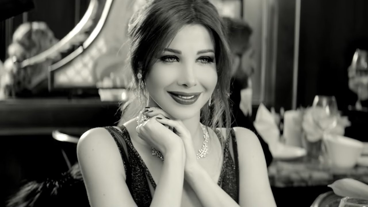 Nancy Ajram Serves Old Hollywood Glamour in “Hassa Beek” Music Video